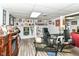 Basement office space with custom shelving, modern furniture, and recessed lighting at 164 Wellington Pkwy, Noblesville, IN 46060