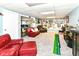 Finished basement featuring a recreation area, office space, and custom shelving at 164 Wellington Pkwy, Noblesville, IN 46060