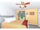 Bright and airy bedroom featuring a comfy bed, a ceiling fan, and warm, inviting colors at 164 Wellington Pkwy, Noblesville, IN 46060