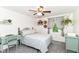Comfortable bedroom featuring a ceiling fan, a sunny window, and charming décor at 164 Wellington Pkwy, Noblesville, IN 46060