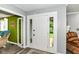 Bright foyer featuring neutral walls, wood-look flooring and a white front door at 164 Wellington Pkwy, Noblesville, IN 46060