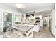 Bright kitchen with a kitchen island, granite countertops, and stainless steel appliances at 164 Wellington Pkwy, Noblesville, IN 46060