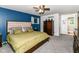 Cozy main bedroom with a comfortable bed, plush carpet, and ample closet space at 164 Wellington Pkwy, Noblesville, IN 46060