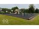 Community playground featuring slides, swings, and climbing structures, perfect for neighborhood enjoyment at 164 Wellington Pkwy, Noblesville, IN 46060