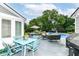 Spacious outdoor patio with a pool and ample seating for relaxation and entertaining at 164 Wellington Pkwy, Noblesville, IN 46060