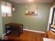 Cozy dining area with wood table, bench, and decorative wall accents at 213 S Coventry Dr, Anderson, IN 46012