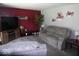 Inviting living room with plush seating, entertainment center, and cozy atmosphere at 213 S Coventry Dr, Anderson, IN 46012