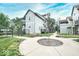 Inviting exterior view of newly built townhomes with landscaped lawns and walkway at 2230 N Pennsylvania N St # 7, Indianapolis, IN 46205