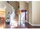 Elegant foyer with hardwood floors and staircase at 2230 N Pennsylvania N St # 7, Indianapolis, IN 46205