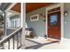 Charming front porch with wooden accents and seating area at 2230 N Pennsylvania N St # 7, Indianapolis, IN 46205