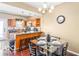 Eat-in kitchen features stainless steel appliances and sleek countertops at 2230 N Pennsylvania N St # 7, Indianapolis, IN 46205