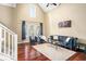 Bright living room features hardwood floors, high ceilings, and plenty of natural light at 2230 N Pennsylvania N St # 7, Indianapolis, IN 46205