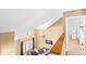 Overhead view of living room with a ceiling fan, and a sitting area with chairs and pillows at 2230 N Pennsylvania N St # 7, Indianapolis, IN 46205