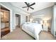 Serene bedroom with en-suite bathroom and ceiling fan at 2230 N Pennsylvania N St # 7, Indianapolis, IN 46205
