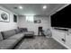 Finished basement rec room with comfortable seating, modern decor, and TV at 250 N 18Th Ave, Beech Grove, IN 46107