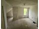 Upstairs bedroom with ample natural light and potential for customization at 2955 N Olney St, Indianapolis, IN 46218