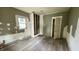 Cozy bedroom with new floors, closet and ample natural light at 2955 N Olney St, Indianapolis, IN 46218