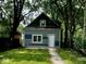 Attractive exterior featuring a well-manicured lawn and inviting entrance at 2955 N Olney St, Indianapolis, IN 46218