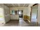 Open-concept living room with sightlines to the kitchen and new flooring at 2955 N Olney St, Indianapolis, IN 46218