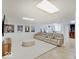 Spacious basement with neutral walls, plush seating, and modern decor, providing relaxation and entertainment at 4075 Dartmoor Dr, Greenwood, IN 46143