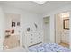 Light bedroom with a large closet, a white dresser, and an ensuite bathroom at 4075 Dartmoor Dr, Greenwood, IN 46143