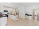 Open kitchen with a center island, stainless steel appliances, and adjoining dining space at 4075 Dartmoor Dr, Greenwood, IN 46143