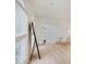 Bright living room area featuring hardwood floors, large windows, and ample natural light at 4075 Dartmoor Dr, Greenwood, IN 46143