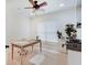 Cozy home office with a ceiling fan, natural light, and a functional workspace at 4075 Dartmoor Dr, Greenwood, IN 46143