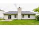 The backyard features a well-maintained lawn and a sliding door leading to the home at 4103 Caddy Way, Indianapolis, IN 46268