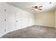 A bedroom with carpet, fresh paint, and a ceiling fan at 4103 Caddy Way, Indianapolis, IN 46268