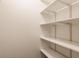 White closet shelving provides space saving storage within the home at 4103 Caddy Way, Indianapolis, IN 46268