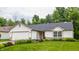 Well-maintained home with a manicured front lawn and a cozy entrance, perfect for a Gathering at 4103 Caddy Way, Indianapolis, IN 46268