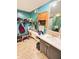 Bathroom includes a vanity, shelves, and a large mirror at 4108 Patricia St, Indianapolis, IN 46222