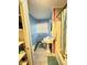 Narrow bathroom featuring a pedestal sink, toilet, and shower-tub combo at 4108 Patricia St, Indianapolis, IN 46222