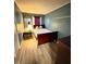 Bedroom with hardwood floors and modern decor at 4108 Patricia St, Indianapolis, IN 46222