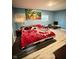 Bedroom featuring hardwood floors and a colorful tapestry at 4108 Patricia St, Indianapolis, IN 46222