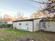 Rear exterior view of the home with a fenced yard at 4108 Patricia St, Indianapolis, IN 46222