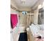 This bathroom features a tub with shower, vanity and sink, and neutral tile at 4114 N Butler Ave, Indianapolis, IN 46226