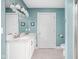 Bathroom featuring double sinks with modern fixtures, vanity, tile floor and shower, for a spa-like experience at 422 Sanders St, Indianapolis, IN 46225