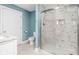 Bathroom featuring a toilet, and a modern glass-enclosed tile shower, offering a luxurious space at 422 Sanders St, Indianapolis, IN 46225