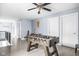 The game room features a foosball table, hardwood floors, and natural light, creating an inviting space at 422 Sanders St, Indianapolis, IN 46225