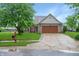 Charming single-Gathering home featuring a well-maintained lawn, brick facade, and inviting curb appeal at 4442 Victory Cir, Indianapolis, IN 46203