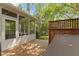 Cozy back deck with a screened-in porch and hot tub, perfect for outdoor relaxation and entertaining at 4763 Woods Edge Dr, Zionsville, IN 46077