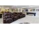 Finished basement featuring leather seating, kitchenette, pool table, and stylish decor at 4763 Woods Edge Dr, Zionsville, IN 46077