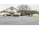 Commercial building with a spacious parking lot and well-maintained landscaping, offering convenience and curb appeal at 4763 Woods Edge Dr, Zionsville, IN 46077