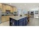 Spacious open kitchen with a large center island, stainless appliances and view of living spaces at 4763 Woods Edge Dr, Zionsville, IN 46077