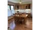 Dining room features a large wooden table, chairs, and built-in cabinets at 5148 Constitution Ct, Columbus, IN 47203