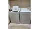 Practical laundry room features a side-by-side washer and dryer at 5148 Constitution Ct, Columbus, IN 47203