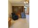 Another view of the living room with custom built-in shelving and comfortable seating at 5148 Constitution Ct, Columbus, IN 47203