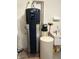 Modern water heater and sink in the garage, providing convenience and efficiency at 5148 Constitution Ct, Columbus, IN 47203